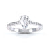Diamond Engagement Ring with a Pear Shape diamond with shoulder set diamonds.