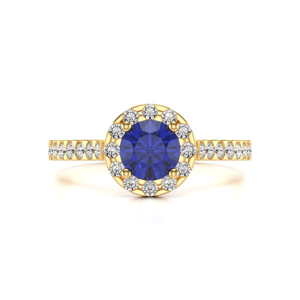 Elegant white gold ring in side profile, adorned with a central blue gemstone and small diamonds along the band, exuding sophistication and luxury.