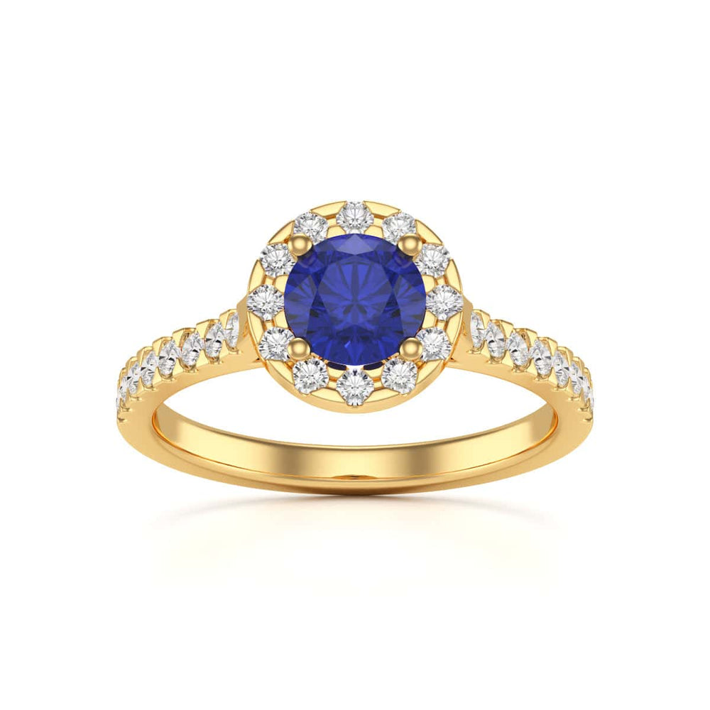 Elegant white gold ring in side profile, adorned with a central blue gemstone and small diamonds along the band, exuding sophistication and luxury.