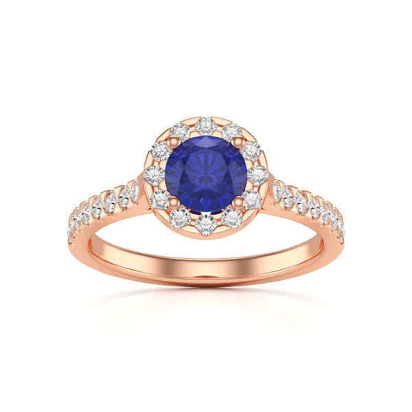Elegant white gold ring in side profile, adorned with a central blue gemstone and small diamonds along the band, exuding sophistication and luxury.