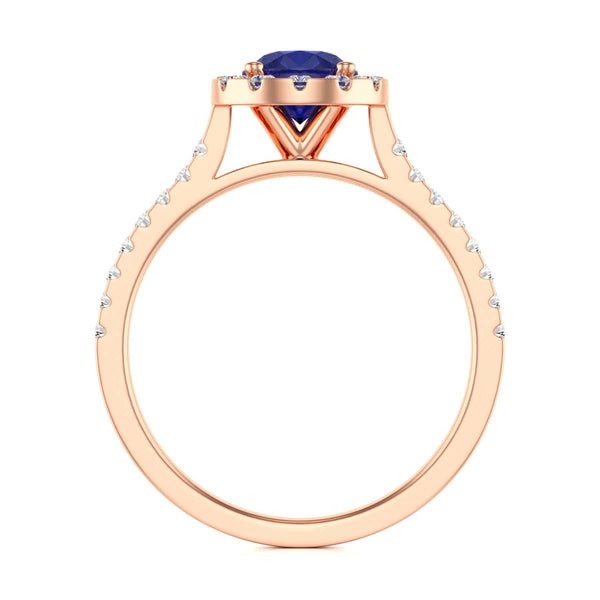 Elegant white gold ring in side profile, adorned with a central blue gemstone and small diamonds along the band, exuding sophistication and luxury.