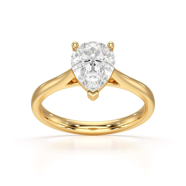 Diamond Solitaire Engagement Ring With a Pear Shape Diamond Solitaire and Tapered Shoulders