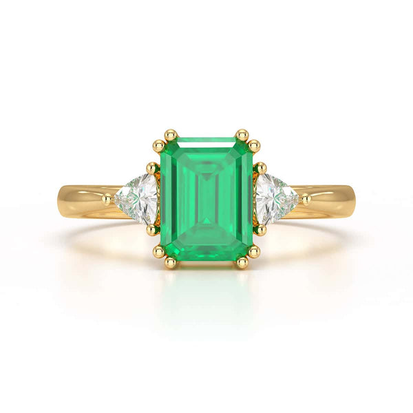 Emerald Trilogy Ring with Trillion side stone Dress Ring