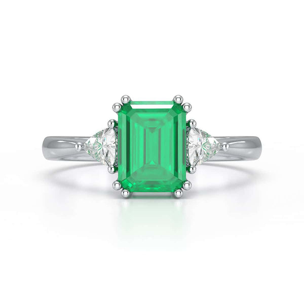 Emerald Trilogy Ring with Trillion side stone Dress Ring