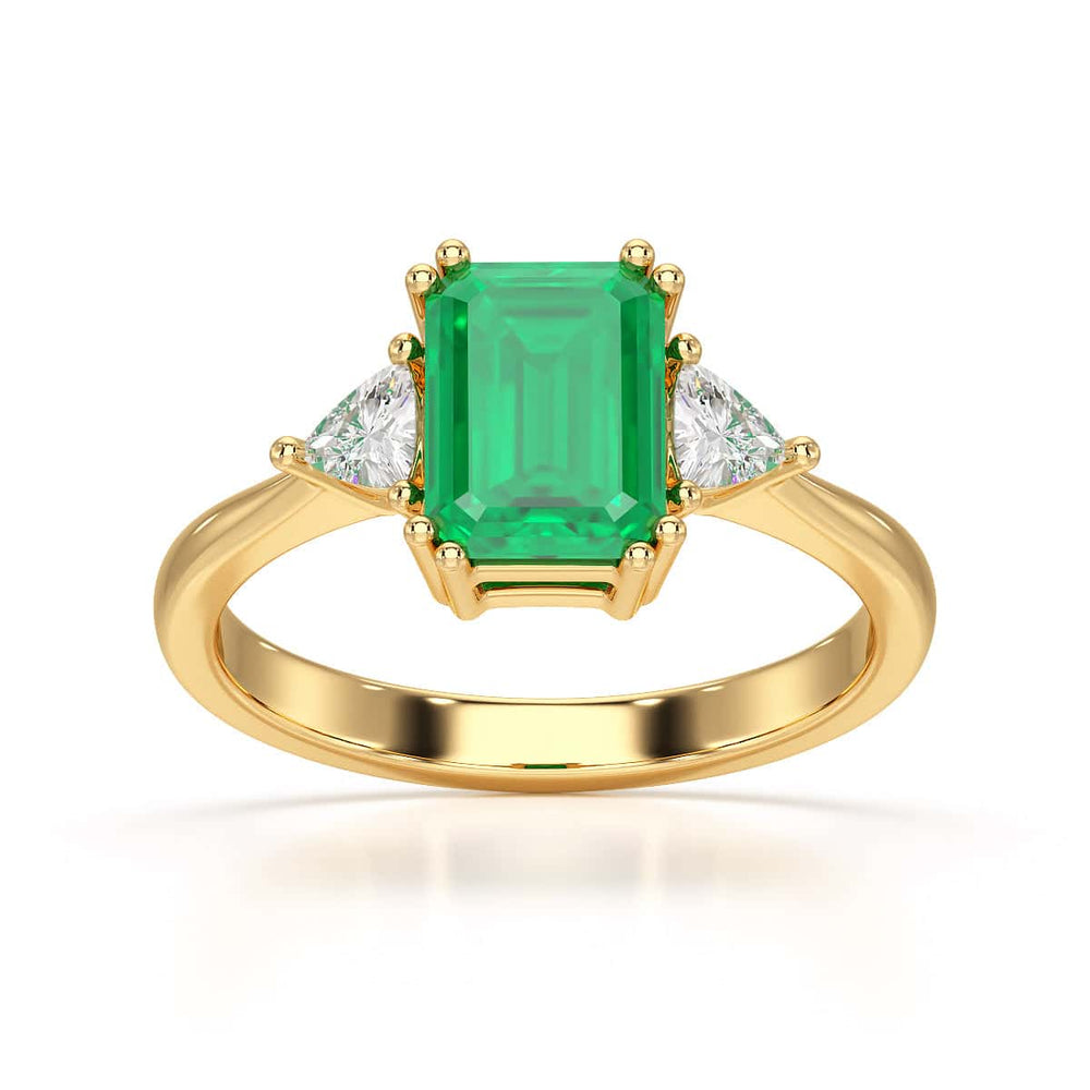 Emerald Trilogy Ring with Trillion side stone Dress Ring