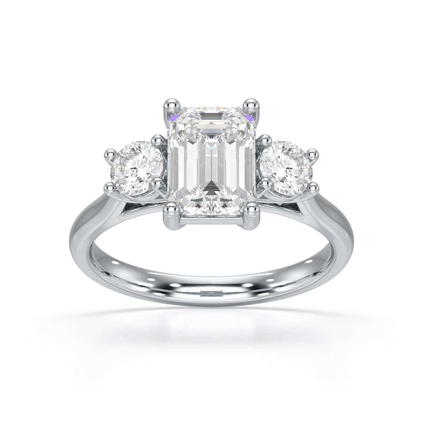 Emerald trilogy Engagement Ring with round side stone