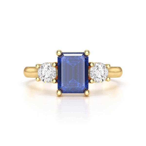 Sapphire trilogy with round side stone Dress ring