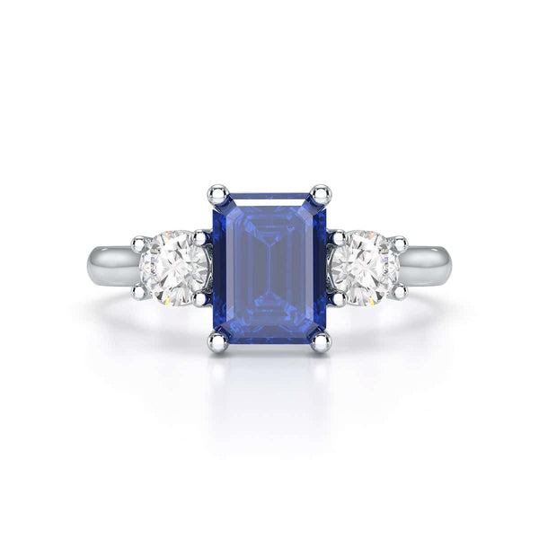 Sapphire trilogy with round side stone Dress ring