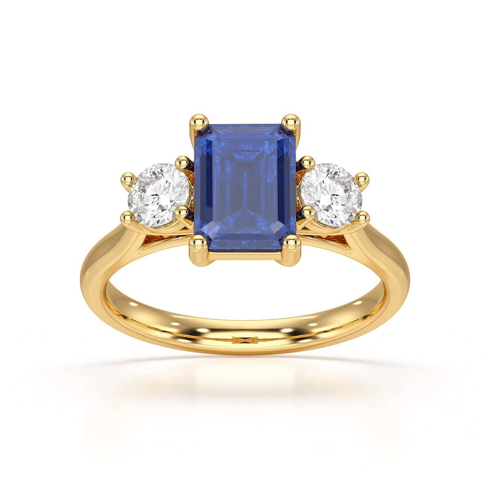 Sapphire trilogy with round side stone Dress ring