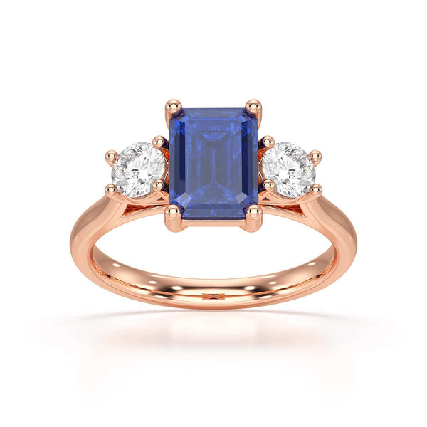 Sapphire trilogy with round side stone Dress ring