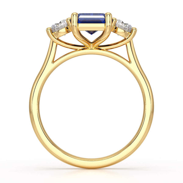 Sapphire trilogy with round side stone Dress ring