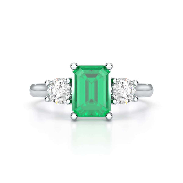 Emerald trilogy with round side stone Dress ring