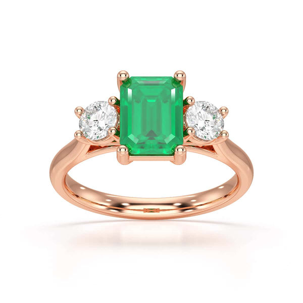 Emerald trilogy with round side stone Dress ring