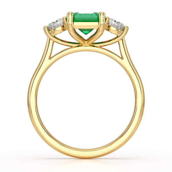 Emerald trilogy with round side stone Dress ring