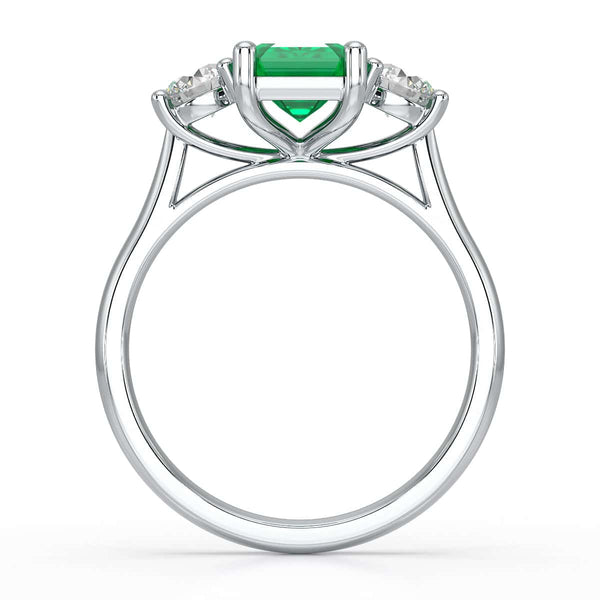 Emerald trilogy with round side stone Dress ring