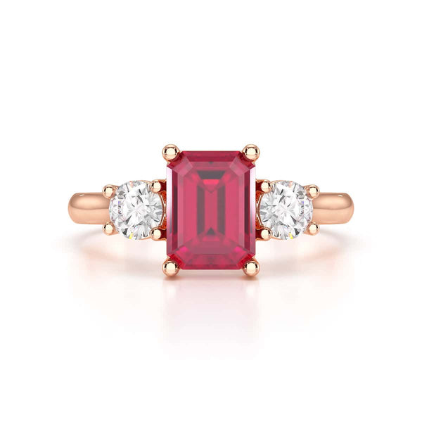 Ruby trilogy with round side stone Dress ring