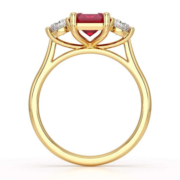 Ruby trilogy with round side stone Dress ring