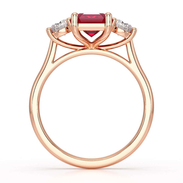Ruby trilogy with round side stone Dress ring
