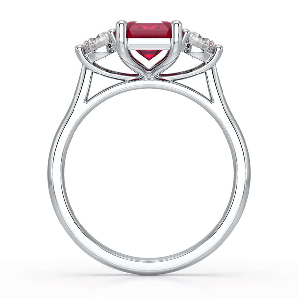 Ruby trilogy with round side stone Dress ring