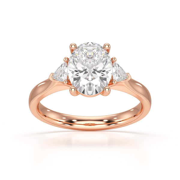 Oval Trilogy Engagement Ring with Trillion side stone