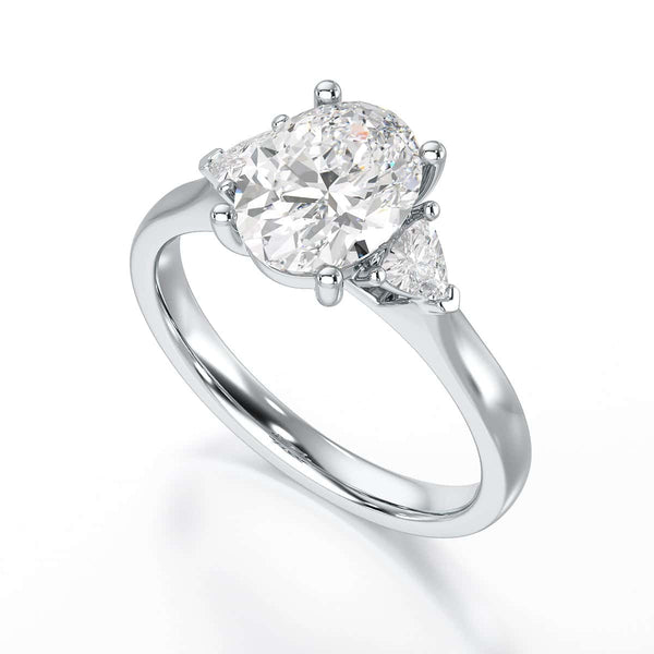 Oval Trilogy Engagement Ring with Trillion side stone