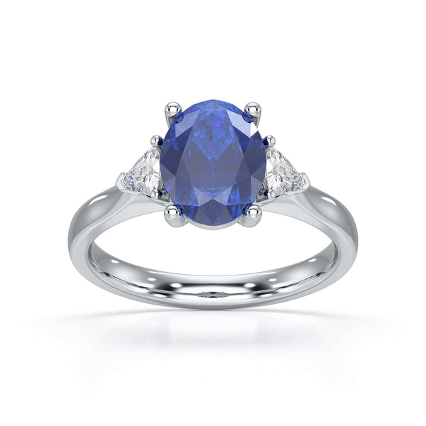 Sapphire trilogy with trillion cut side diamond Dress ring