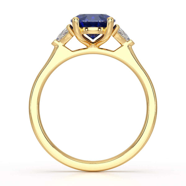 Sapphire trilogy with trillion cut side diamond Dress ring