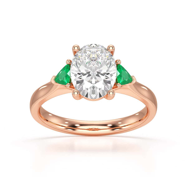 Oval trilogy with trillion side stones Dress ring