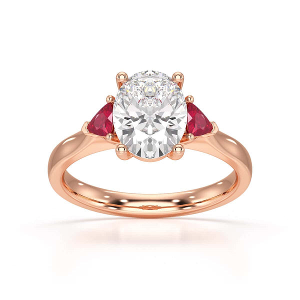 Oval trilogy engagement ring with trillion shape ruby