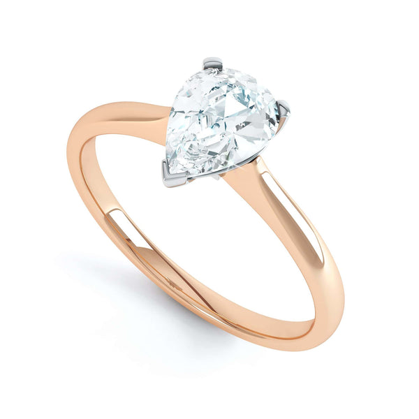 Diamond Solitaire Engagement Ring with a Pear Shape Diamond with a Knife Edge shoulders
