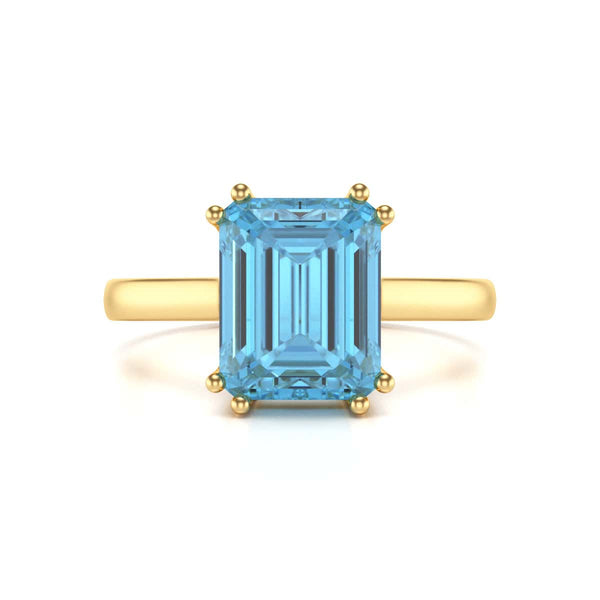 Emerald Cut Blue Topaz Solitaire Dress Ring
