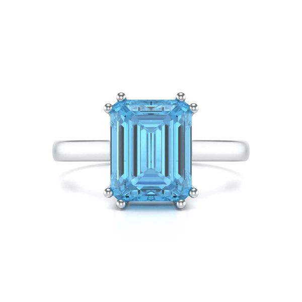 Emerald Cut Blue Topaz Solitaire Dress Ring