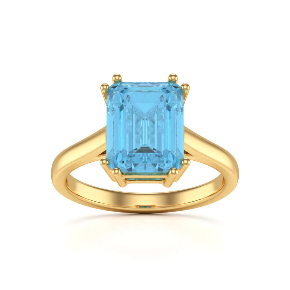 Emerald Cut Blue Topaz Solitaire Dress Ring