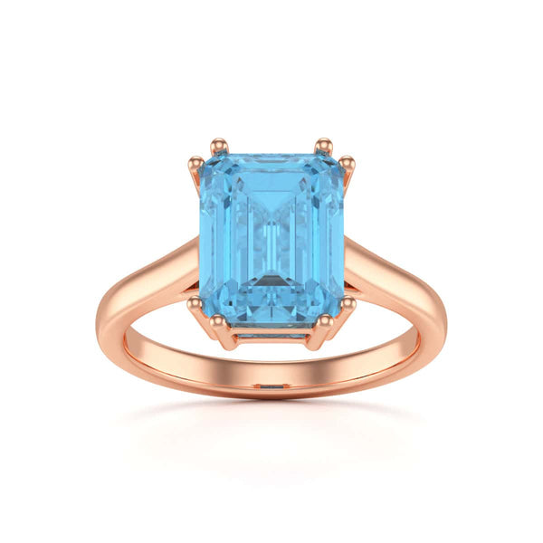 Emerald Cut Blue Topaz Solitaire Dress Ring