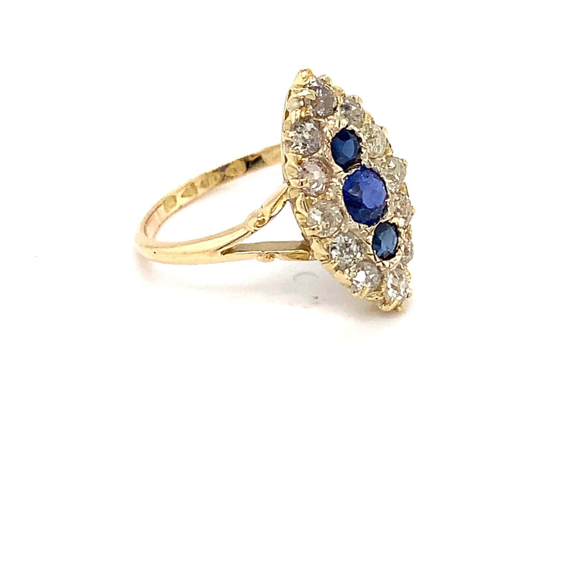 A Victorian Style Blue Sapphire and Diamond Marquise Shaped Cluster Ring.