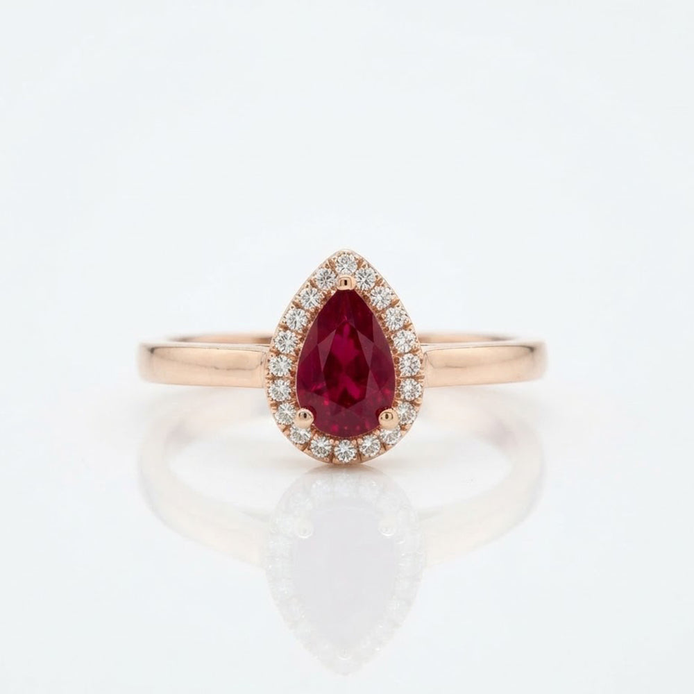 9K Yellow Gold Pear-Cut Ruby & Diamond Halo Ring