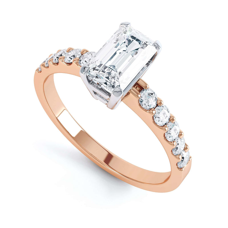 Emerald Cut Diamond Solitaire Engagement Ring With Diamond Shoulders