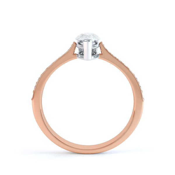 Diamond Engagement Ring with a Pear Shape diamond with shoulder set diamonds.