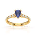 Pear Blue Sapphire with Diamond Set Shoulders Ring in 18ct Gold and Platinum