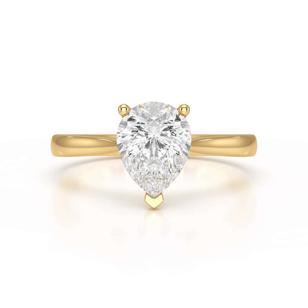 Diamond Solitaire Engagement Ring With a Pear Shape Diamond Solitaire and Tapered Shoulders