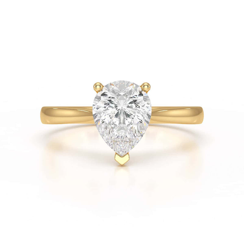Diamond Solitaire Engagement Ring With a Pear Shape Diamond Solitaire and Tapered Shoulders