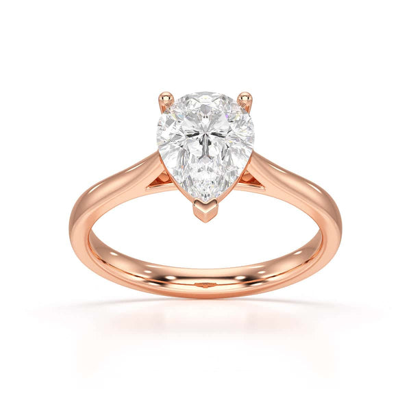 Diamond Solitaire Engagement Ring With a Pear Shape Diamond Solitaire and Tapered Shoulders