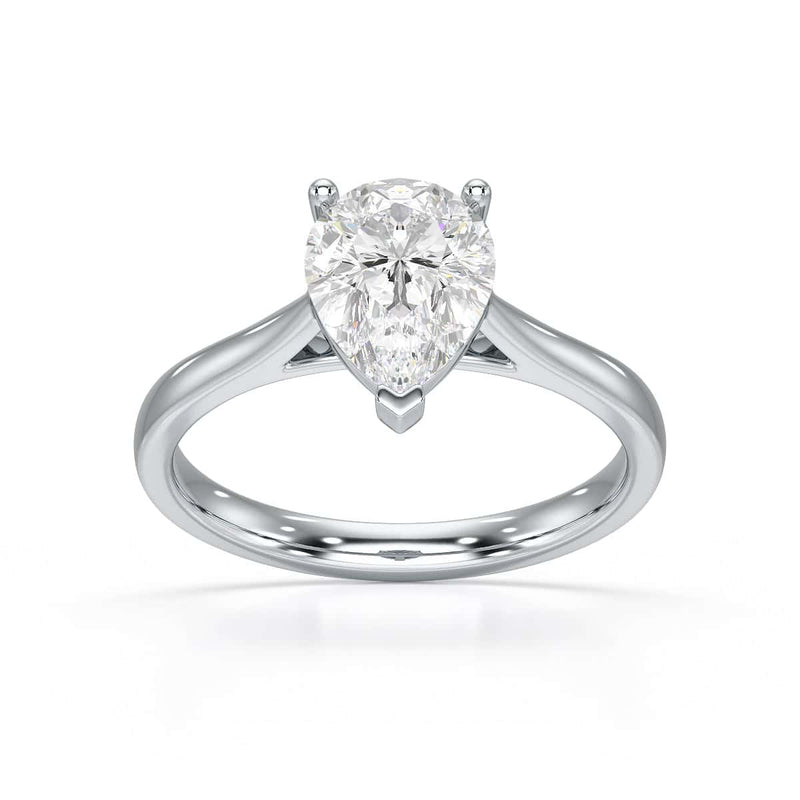 Diamond Solitaire Engagement Ring With a Pear Shape Diamond Solitaire and Tapered Shoulders