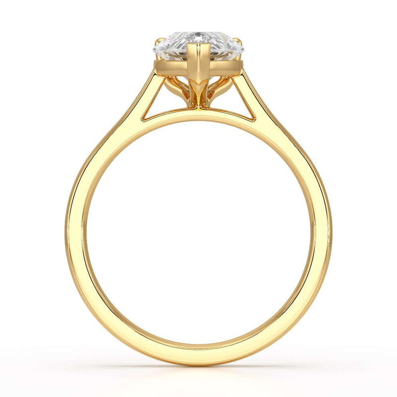 Diamond Solitaire Engagement Ring With a Pear Shape Diamond Solitaire and Tapered Shoulders