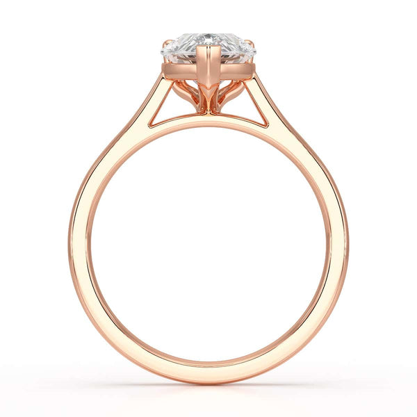 Diamond Solitaire Engagement Ring With a Pear Shape Diamond Solitaire and Tapered Shoulders