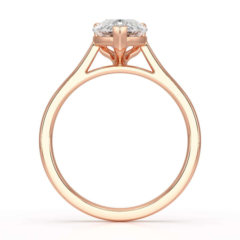 Diamond Solitaire Engagement Ring With a Pear Shape Diamond Solitaire and Tapered Shoulders