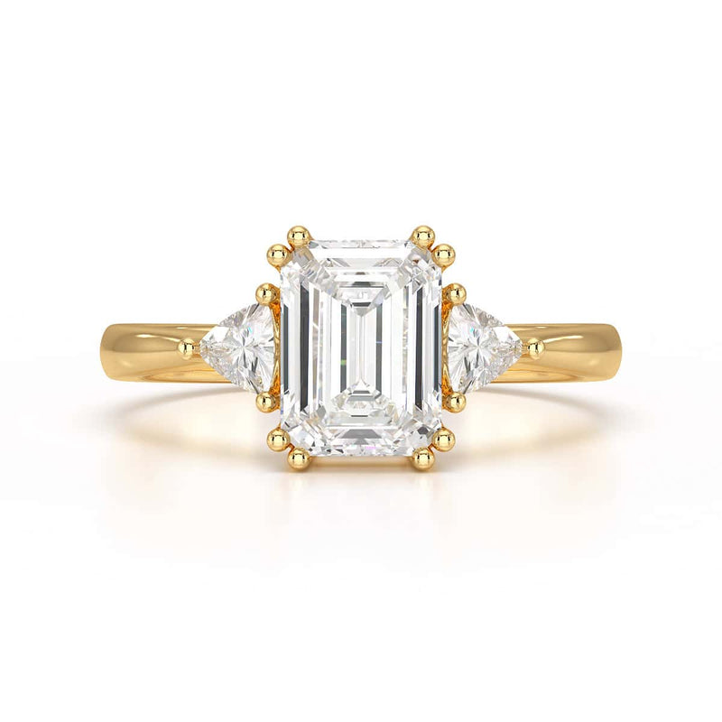 Emerald Trilogy Ring with Trillion side stone Engagement Ring