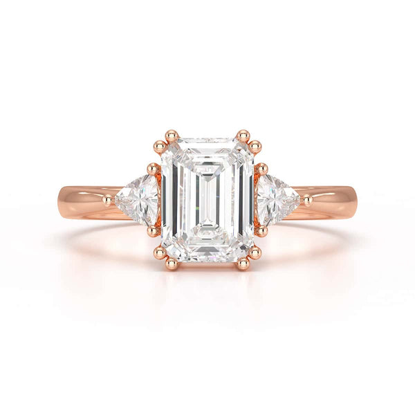 Emerald Trilogy Ring with Trillion side stone Engagement Ring