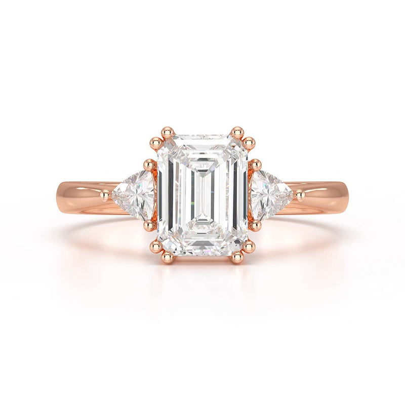 Emerald Trilogy Ring with Trillion side stone Engagement Ring