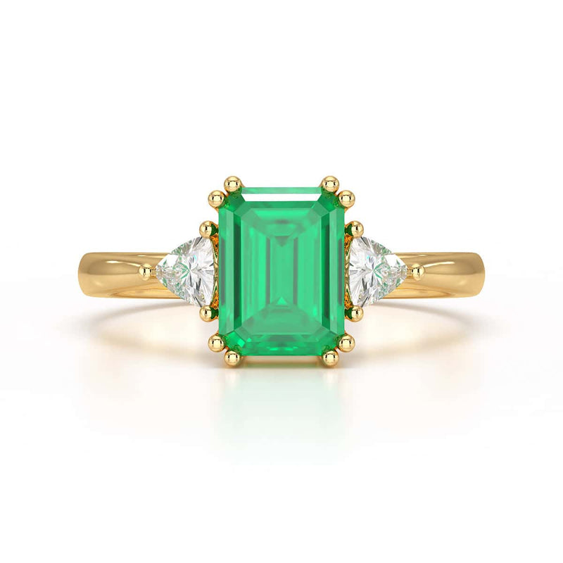 Emerald Trilogy Ring with Trillion side stone Dress Ring